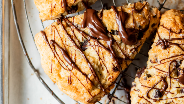 Chocolate chip scones with chocolate drizzle on top